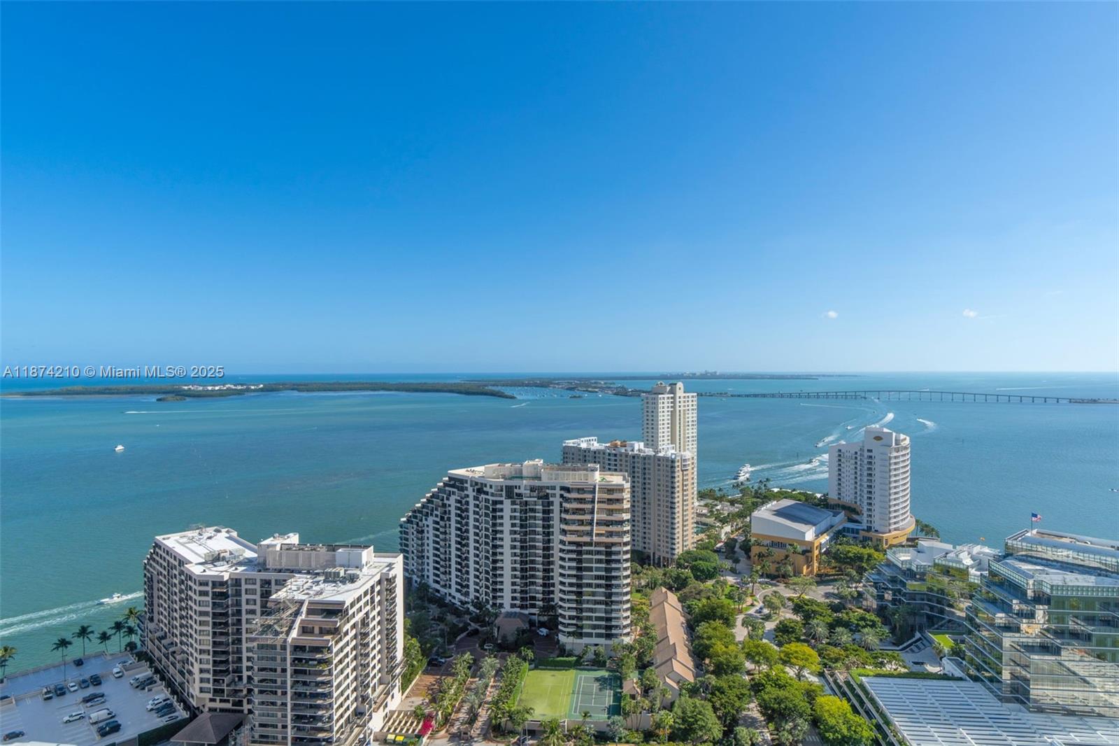 900 Brickell Key Boulevard, Unit 2904 Miami, FL 33131 - Photo 15 of 21 a view of a city with a lake