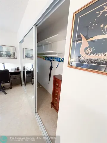 a view of living room with furniture and window