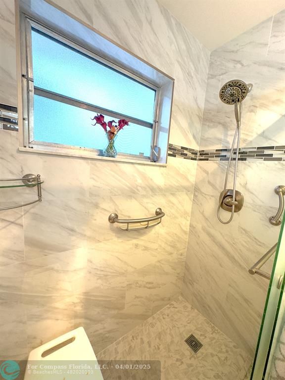 4525 Northwest 3rd Court Delray Beach, FL 33445 - Photo 18 of 23 a bathroom with a shower