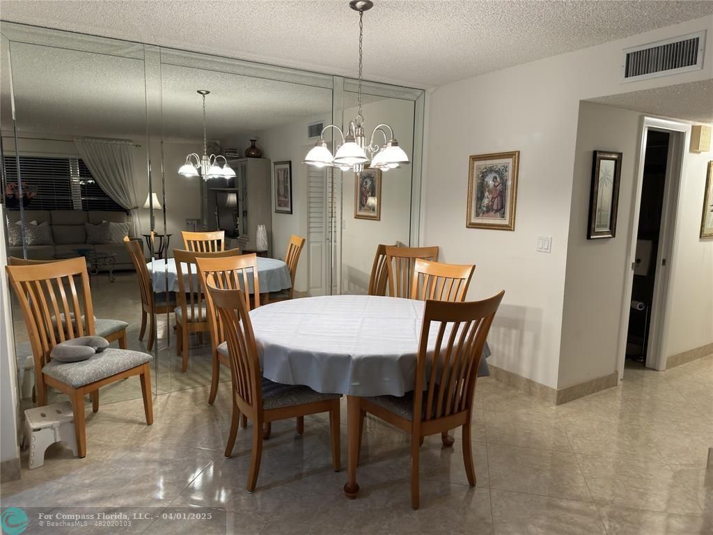4525 Northwest 3rd Court Delray Beach, FL 33445 - Photo 10 of 23 a view of a dining room with furniture