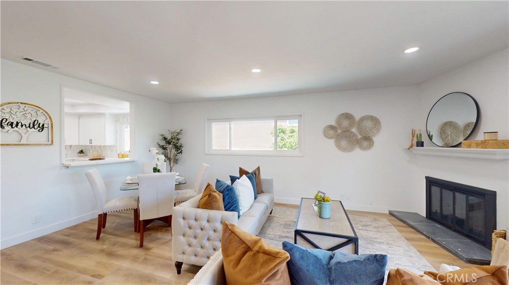1354 Shadow Fullerton, CA 92831 - Photo 17 of 30 a living room with furniture and wooden floor
