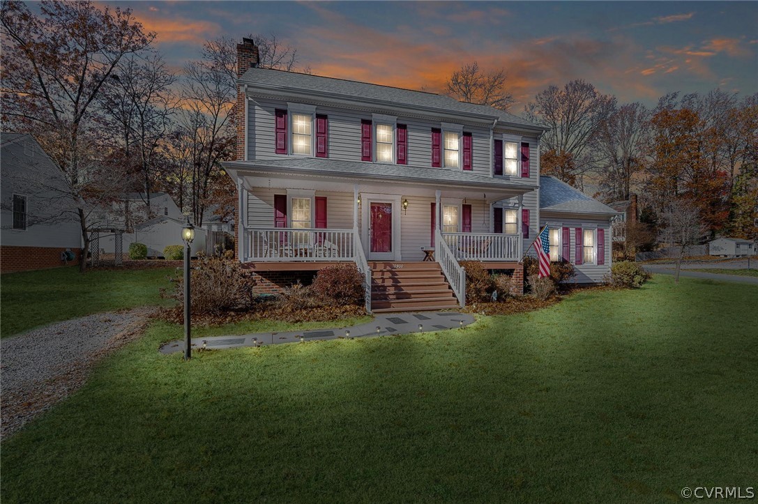 10900 Crofton Road Chester, VA 23831 - Photo 1 of 32 a view of house with a yard
