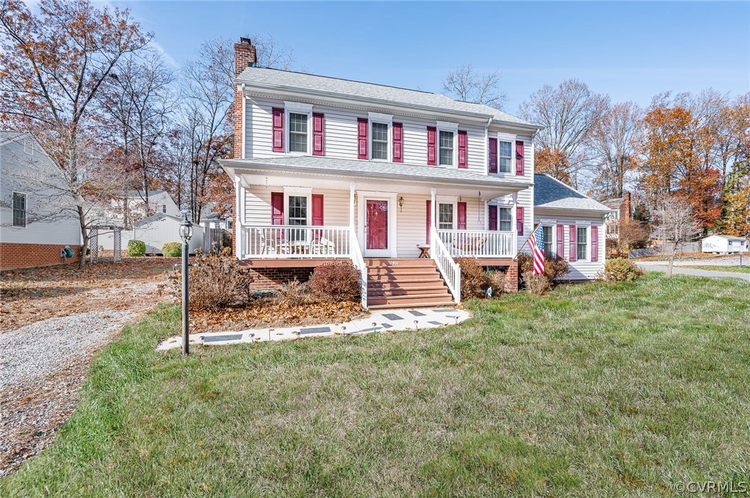 10900 Crofton Road Chester, VA 23831 - Photo 3 of 32 a view of a house with a yard and sitting area