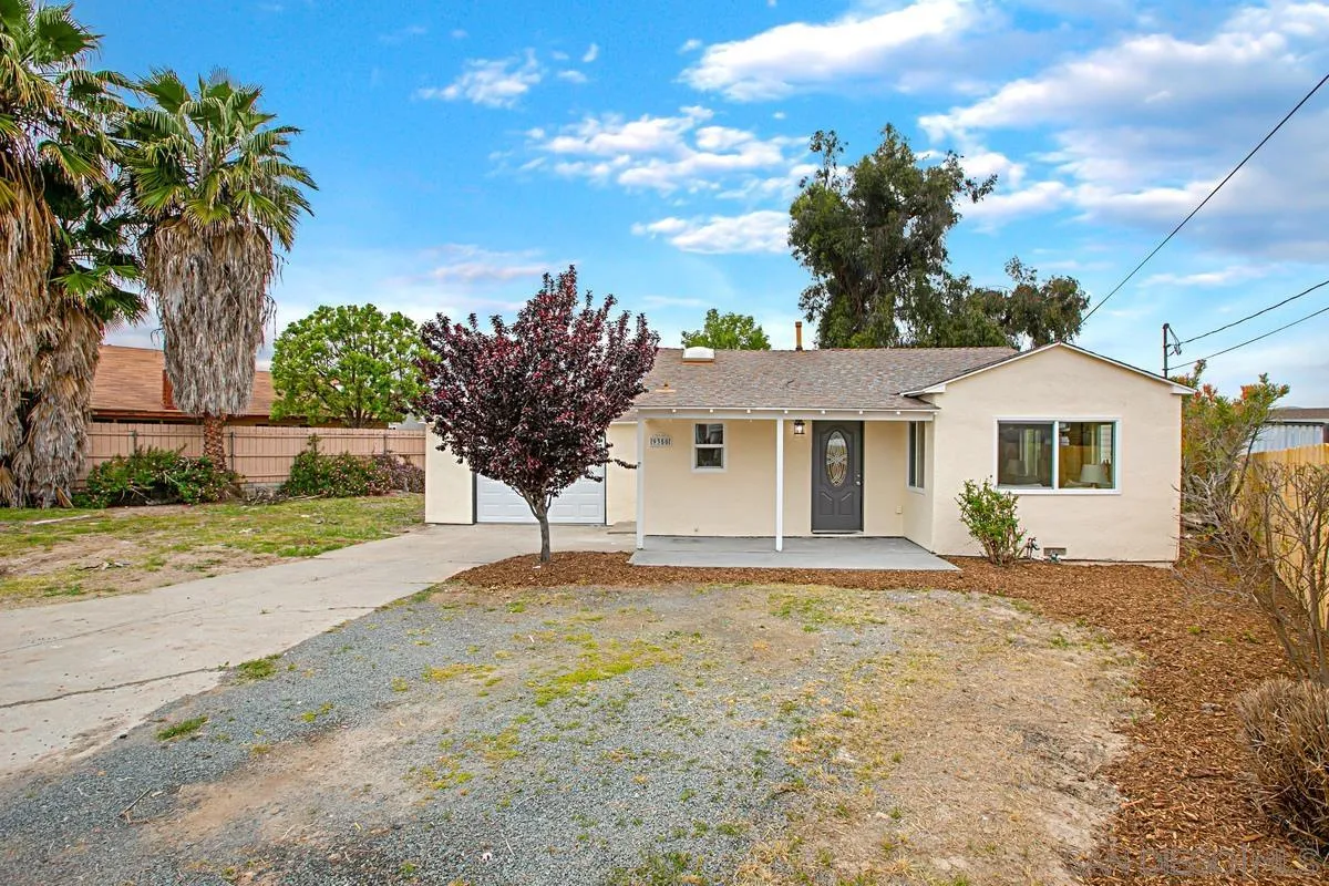 9350 Rapture Lane Santee, CA 92071 - Photo 1 of 30 a view of a house with a yard