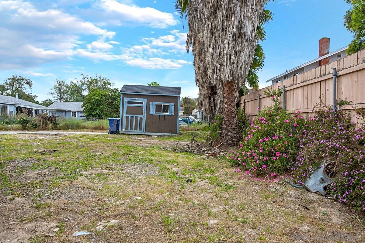 9350 Rapture Lane Santee, CA 92071 - Photo 26 of 30 a view of a house with backyard and garden