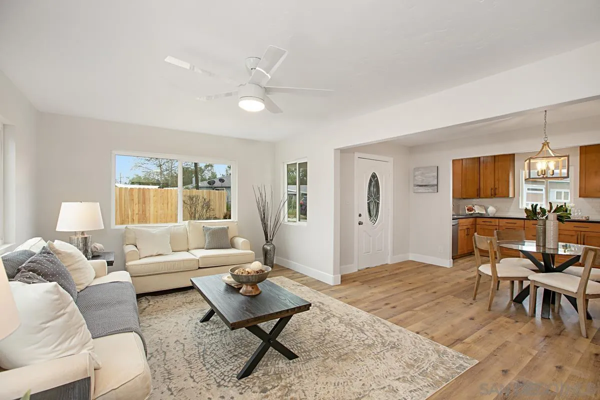 9350 Rapture Lane Santee, CA 92071 - Photo 8 of 30 a living room with furniture and a wooden floor