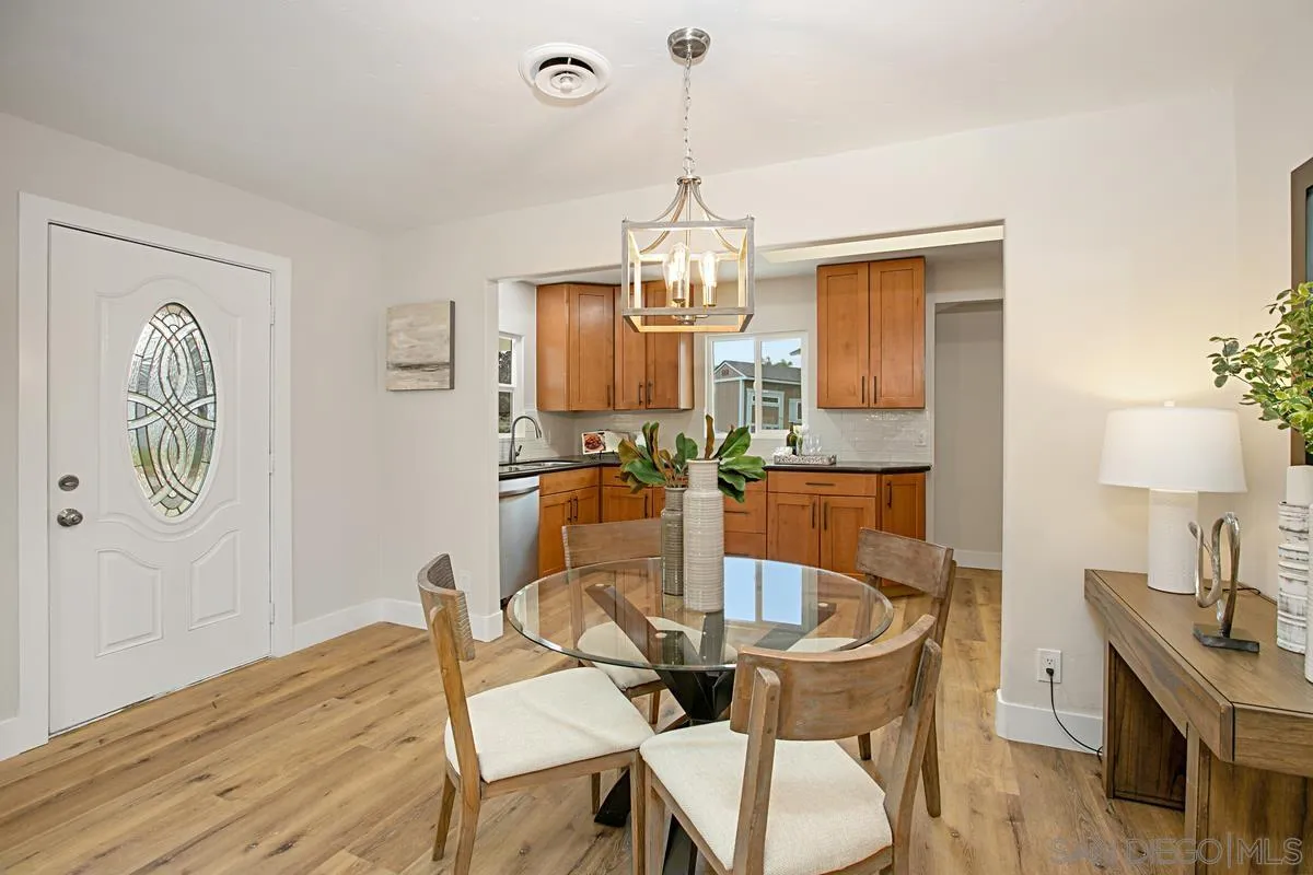 9350 Rapture Lane Santee, CA 92071 - Photo 9 of 30 a dining room with furniture and window