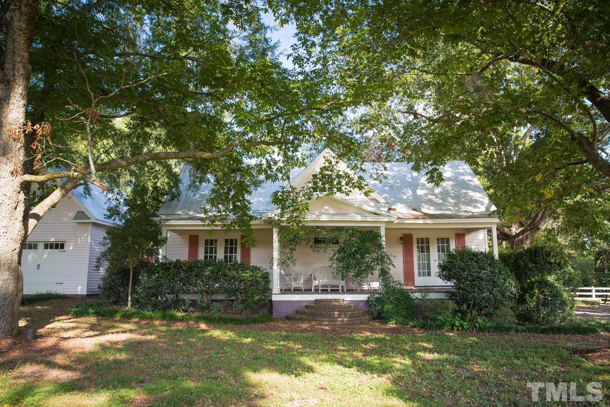 395 Cecil Road Wendell, NC 27591 - Photo 2 of 29 a view of a yard in front of a house