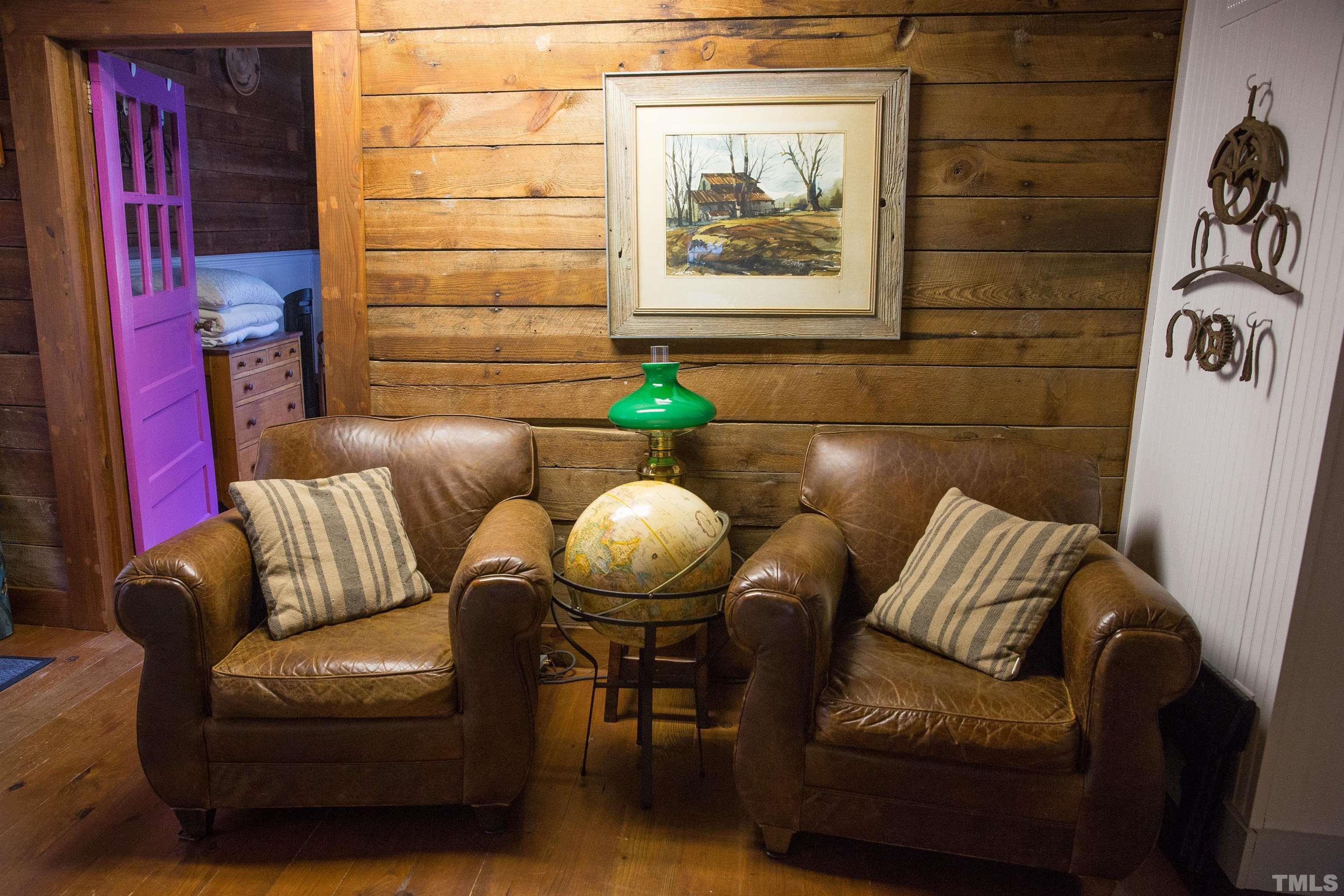 395 Cecil Road Wendell, NC 27591 - Photo 18 of 29 a living room with furniture and a painting