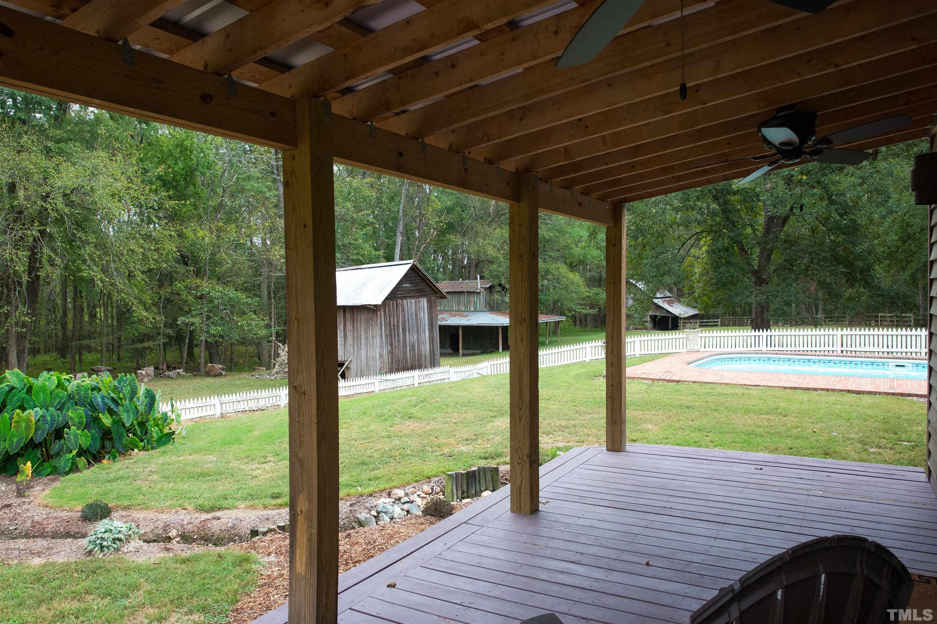 395 Cecil Road Wendell, NC 27591 - Photo 21 of 29 a view of porch with a patio