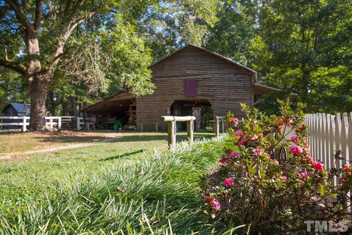 395 Cecil Road Wendell, NC 27591 - Photo 24 of 29 a front view of a house with a yard