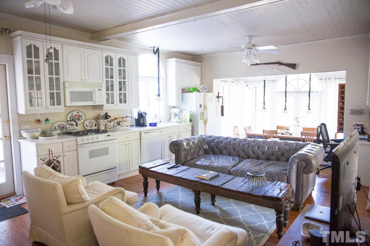 395 Cecil Road Wendell, NC 27591 - Photo 6 of 29 a living room with furniture and a large window
