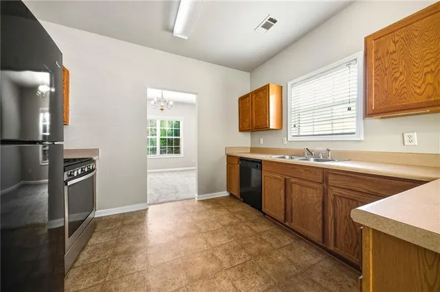a view of a kitchen with a sink