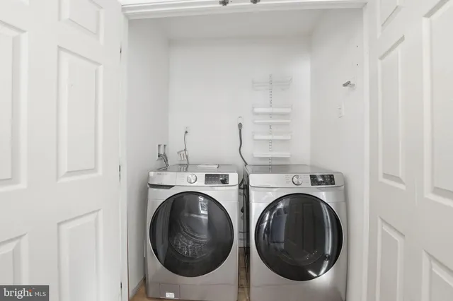 a utility room with dryer and washer