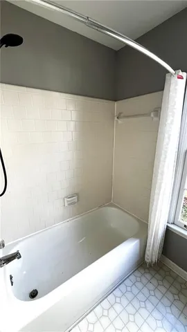 a view of a backyard of the house