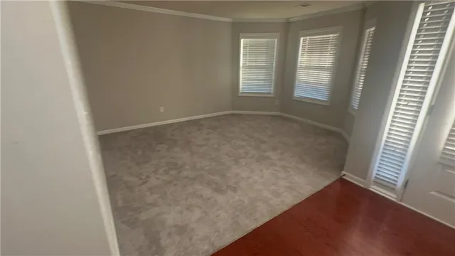 an empty room with windows