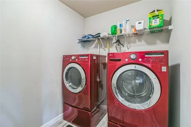 a utility room with dryer and washer