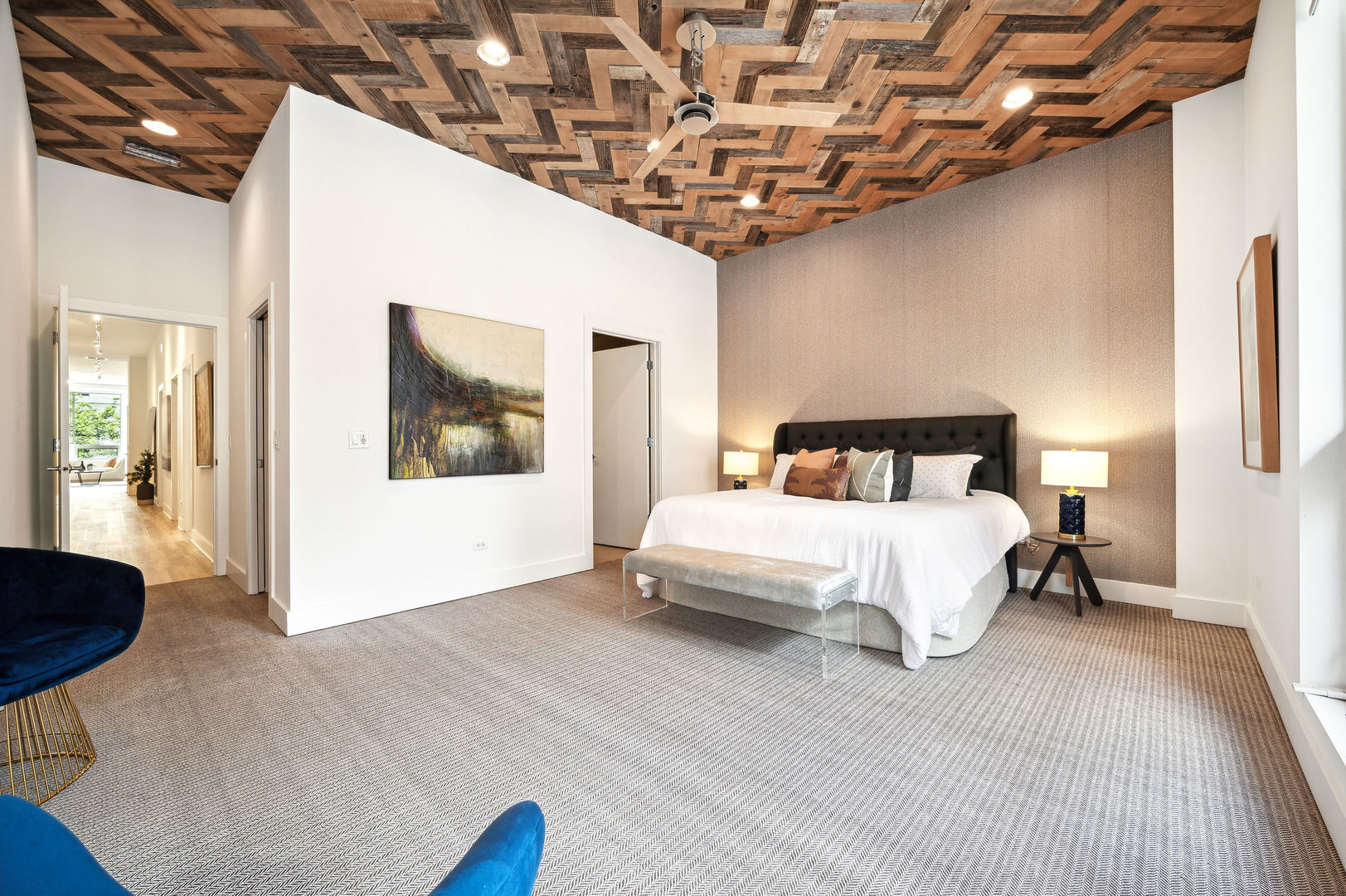 16 North Carpenter Street, Unit 2S Chicago, IL 60607 - Photo 12 of 21 a bedroom with a large bed and a chandelier