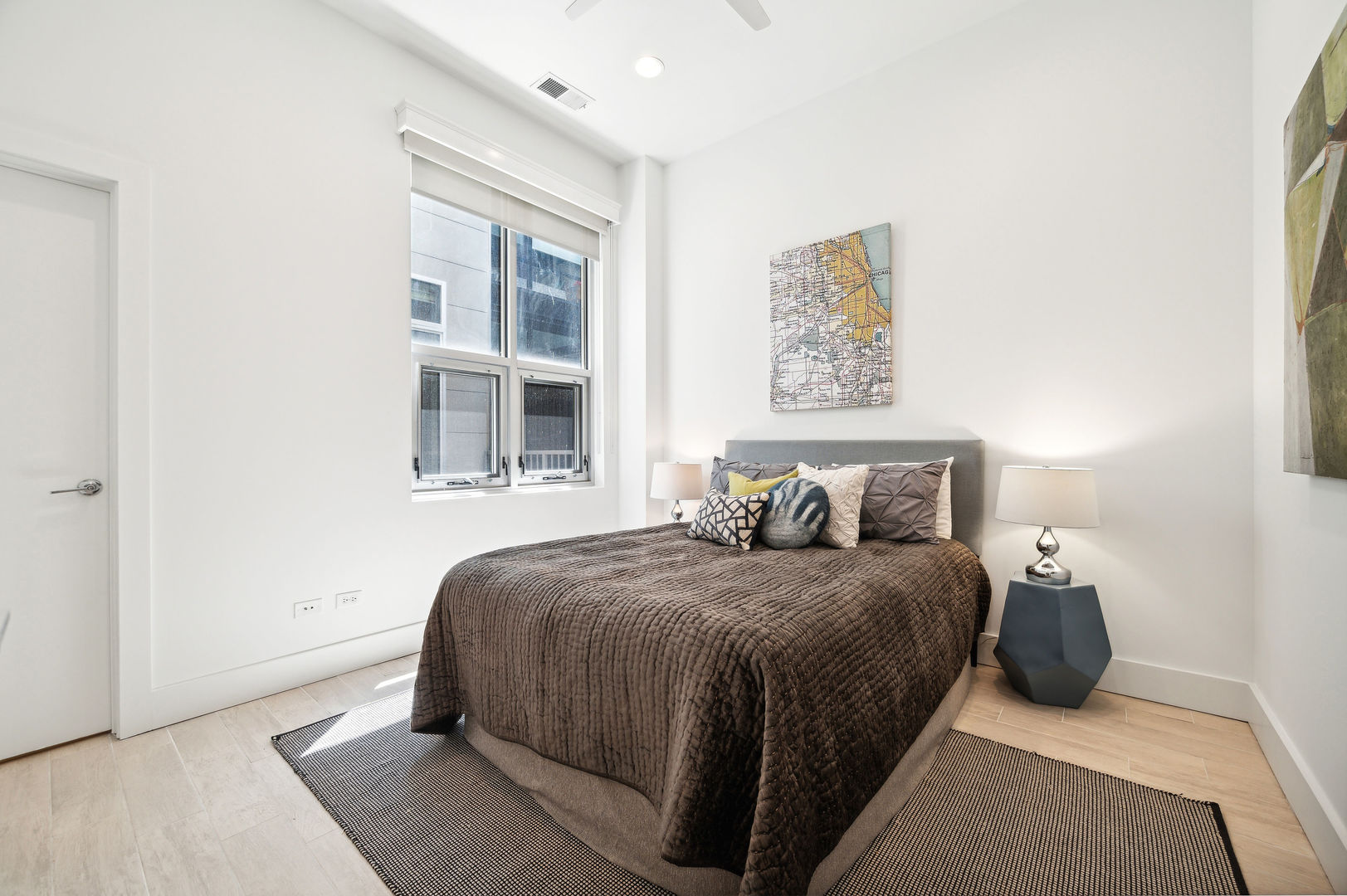 16 North Carpenter Street, Unit 2S Chicago, IL 60607 - Photo 14 of 21 a bedroom with a bed and a window