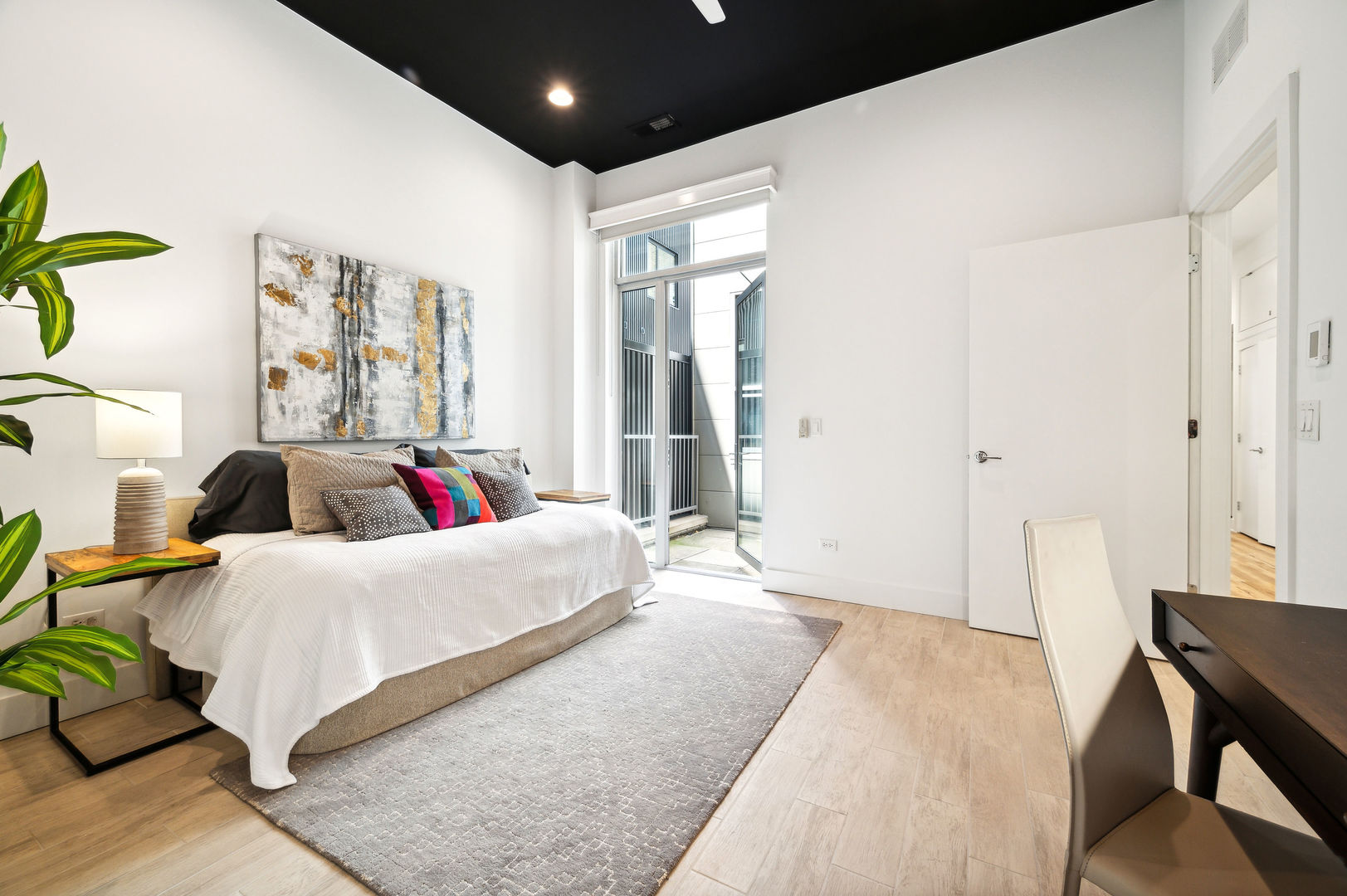 16 North Carpenter Street, Unit 2S Chicago, IL 60607 - Photo 17 of 21 a living room with furniture and wooden floor