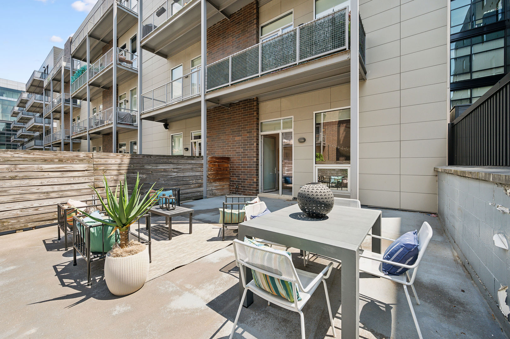 16 North Carpenter Street, Unit 2S Chicago, IL 60607 - Photo 20 of 21 a view of a chairs and table in a patio