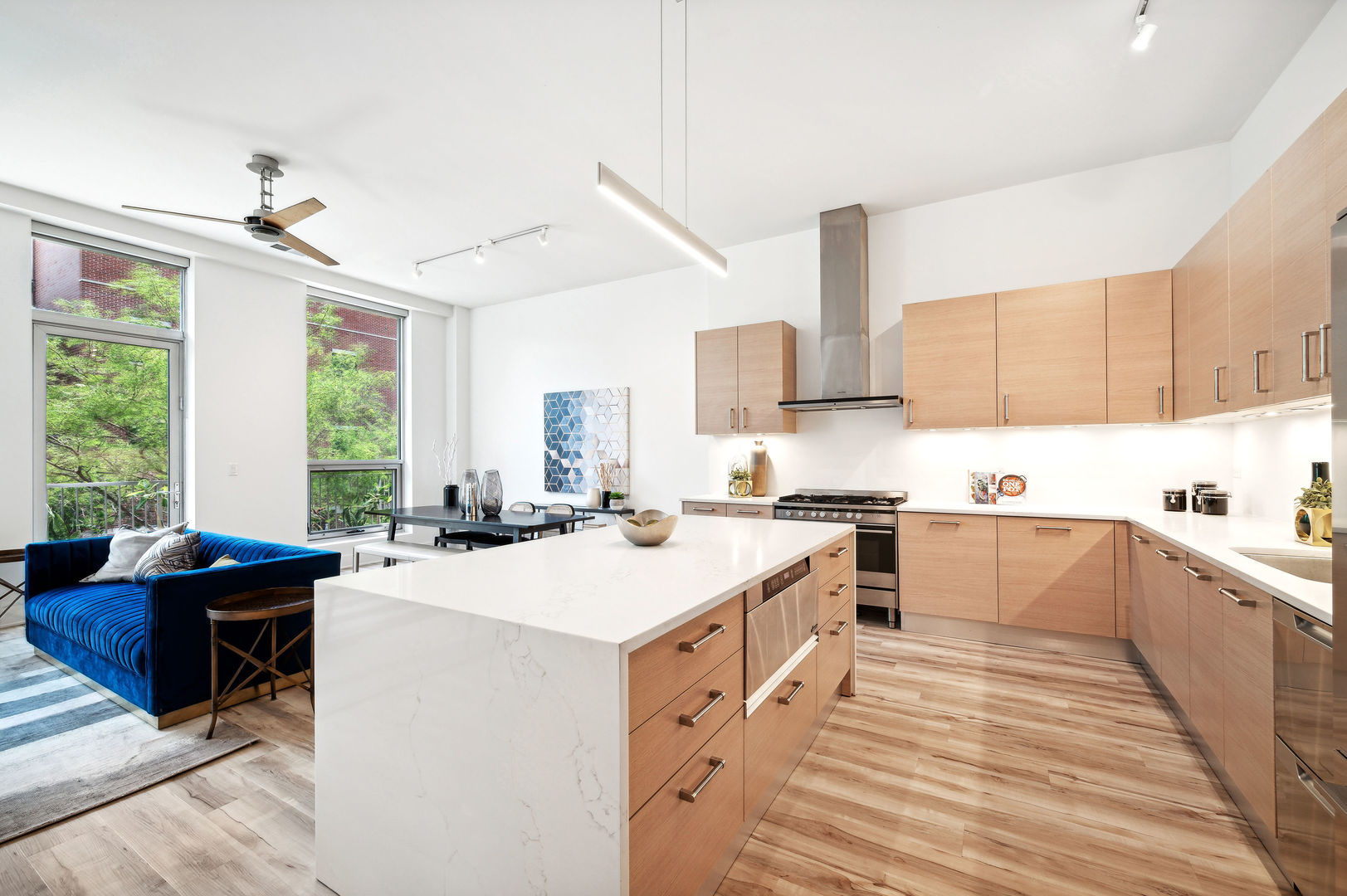 16 North Carpenter Street, Unit 2S Chicago, IL 60607 - Photo 8 of 21 a kitchen with a sink stove and cabinets