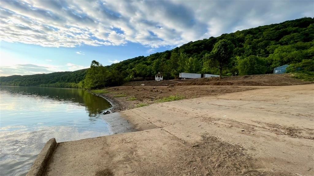 136 Bunola River Road Monongahela, PA 15063 - Photo 5 of 8 a view of a road with a yard