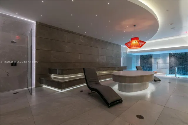 a outdoor space with patio lots of white furniture and window