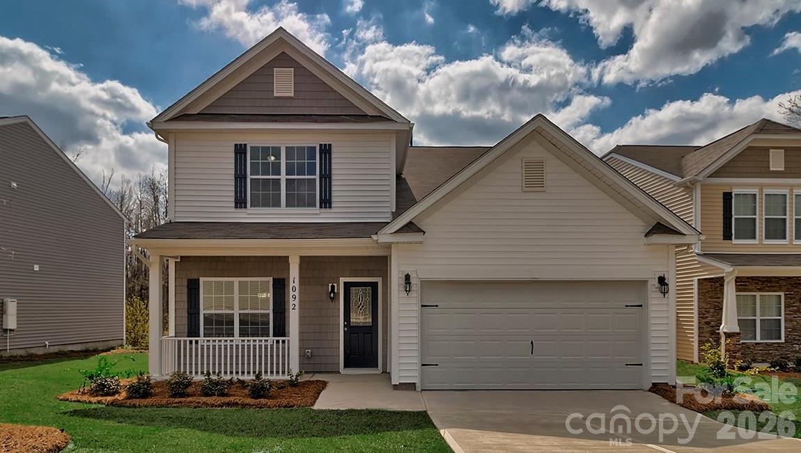 109 Piney Wds Road Fletcher, NC 28732 - Photo 1 of 28 a front view of a house with garden