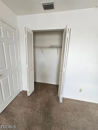 an empty room with a workbench