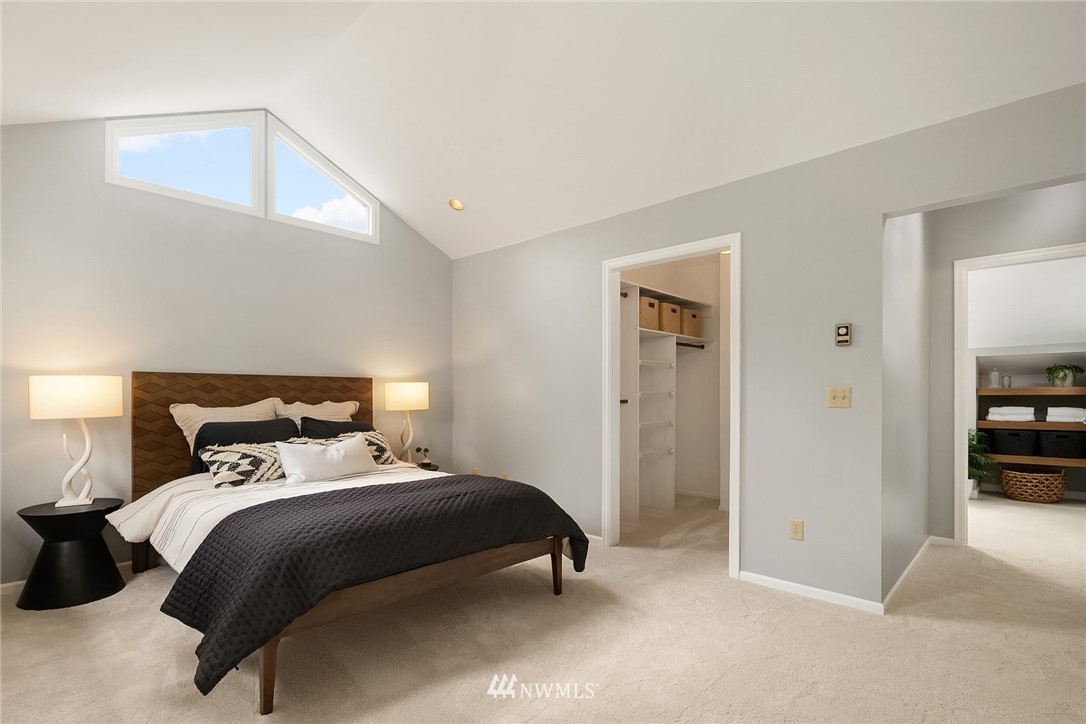 4730 Spring Street Bellingham, WA 98229 - Photo 22 of 30 a bedroom with a bed and a lamp