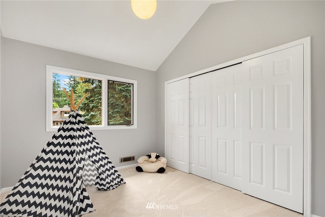 4730 Spring Street Bellingham, WA 98229 - Photo 24 of 30 a bedroom with a bed and a window