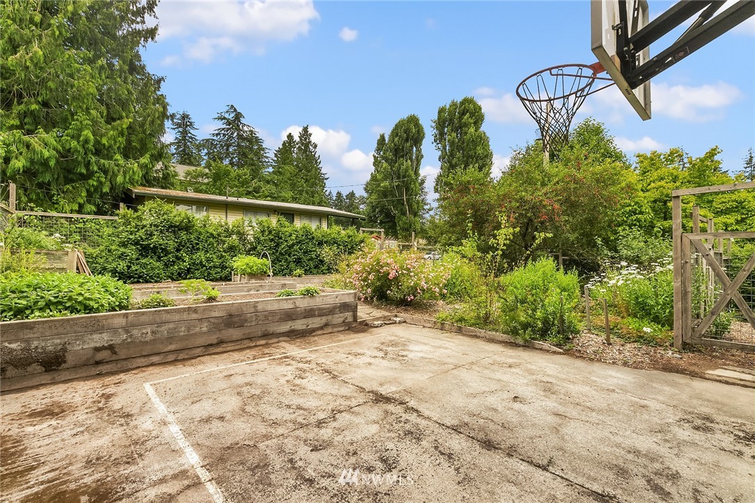4730 Spring Street Bellingham, WA 98229 - Photo 26 of 30 a view of a yard with flower plants