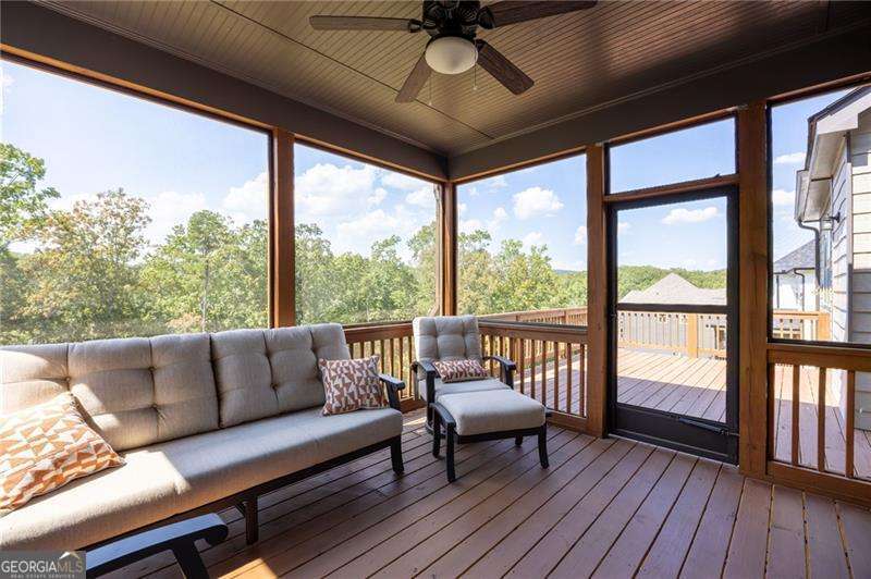 61 Roberson Drive White, GA 30184 - Photo 11 of 46 a living room with furniture and a large window