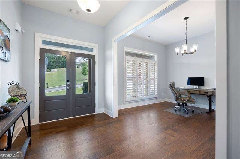 61 Roberson Drive White, GA 30184 - Photo 13 of 46 a view of a livingroom with workspace and a window