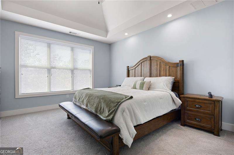 61 Roberson Drive White, GA 30184 - Photo 33 of 46 a bedroom with a bed and a window