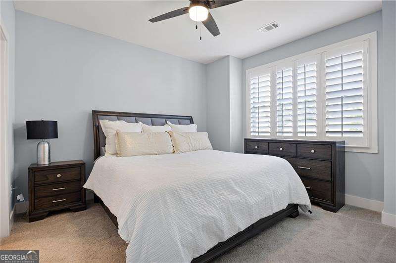 61 Roberson Drive White, GA 30184 - Photo 38 of 46 a bedroom with a bed and a tv