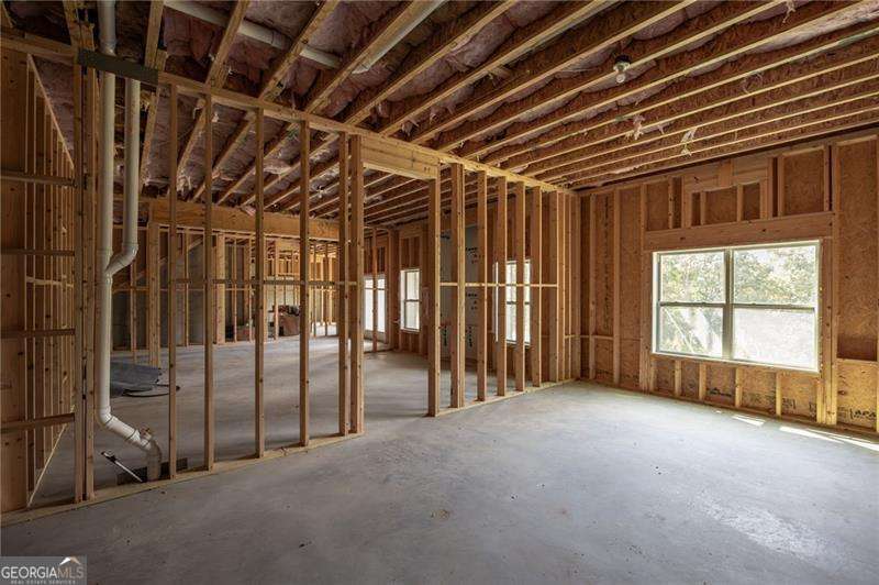61 Roberson Drive White, GA 30184 - Photo 44 of 46 a view of empty room with wooden floor