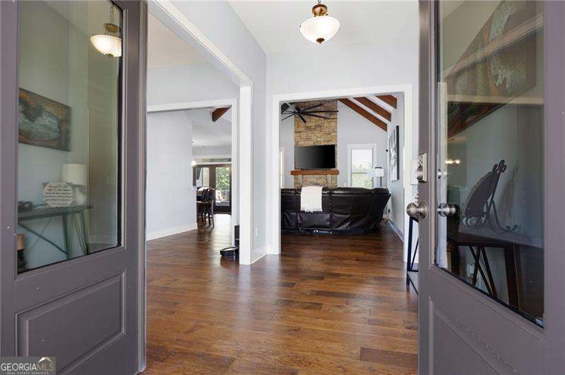 61 Roberson Drive White, GA 30184 - Photo 7 of 46 a view of living room with furniture and wooden floor