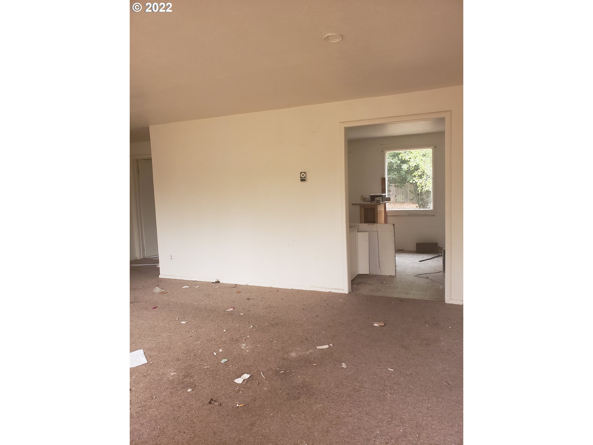1415 Water Street Springfield, OR 97477 - Photo 4 of 5 a view of a living room with a hallway