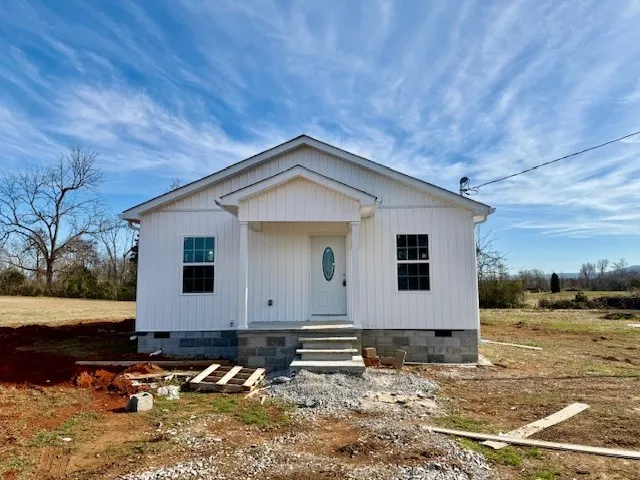 a front view of house with yard