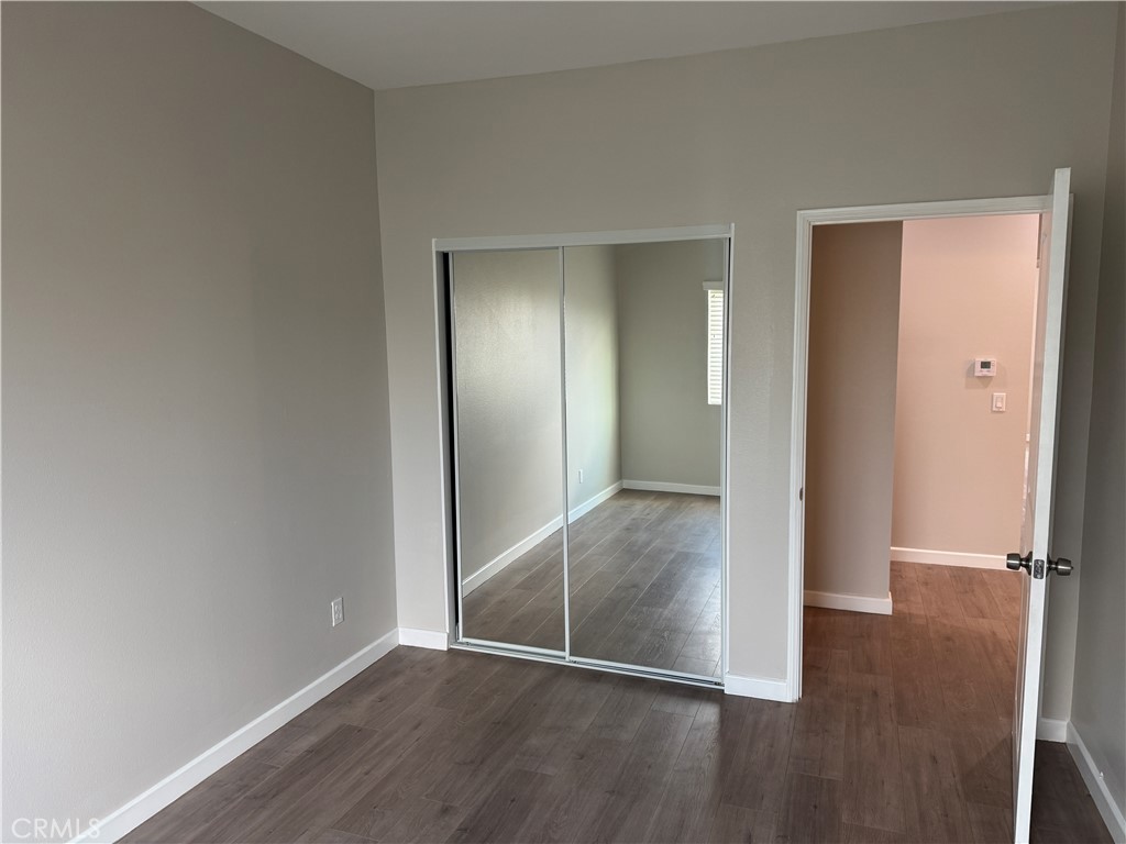 13665 Arrow Route, Unit 3 Fontana, CA 92335 - Photo 18 of 32 a view of wooden floor
