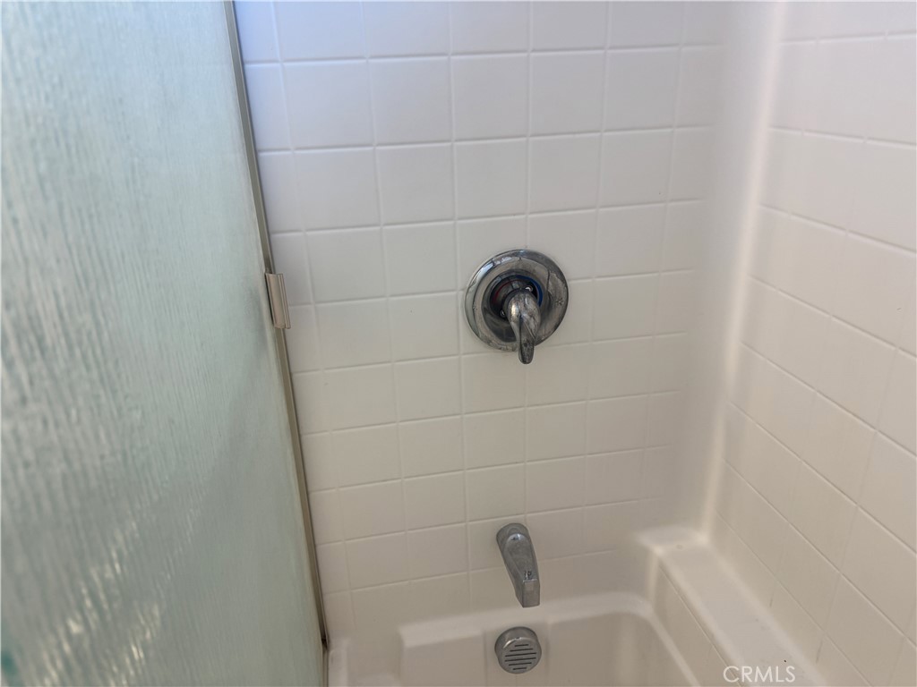 13665 Arrow Route, Unit 3 Fontana, CA 92335 - Photo 28 of 32 a close view of a bathtub in a bathroom