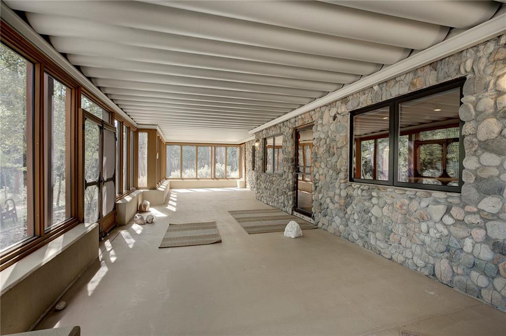 78 Double Tree Road Bailey, CO 80421 - Photo 29 of 34 a hallway with a large window