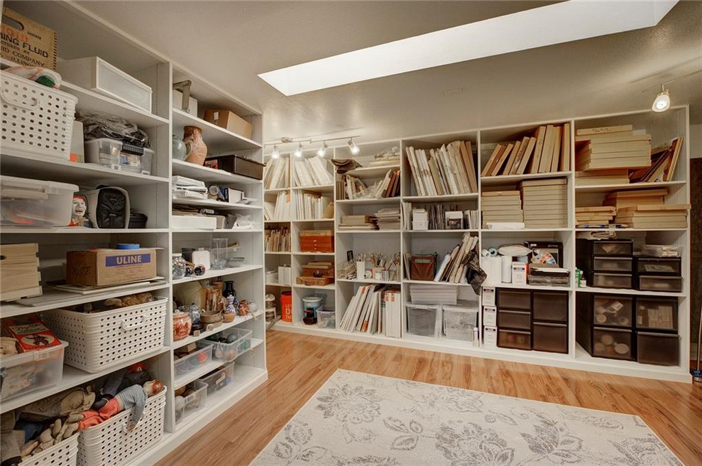78 Double Tree Road Bailey, CO 80421 - Photo 34 of 34 a view of a livingroom with shelves