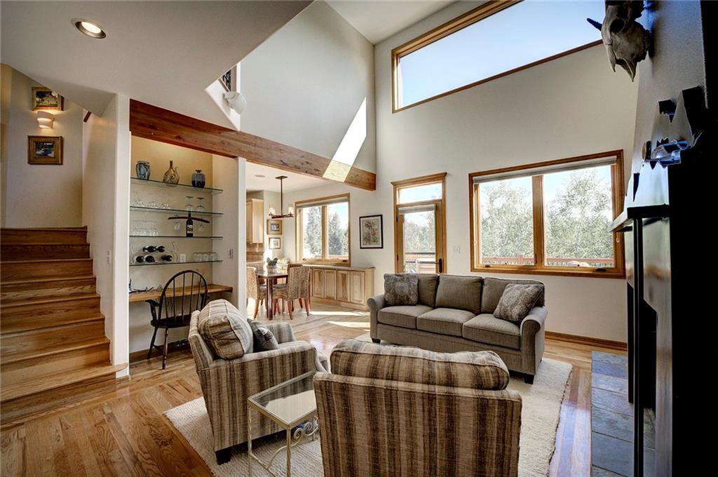 78 Double Tree Road Bailey, CO 80421 - Photo 10 of 34 a living room with furniture and a large window