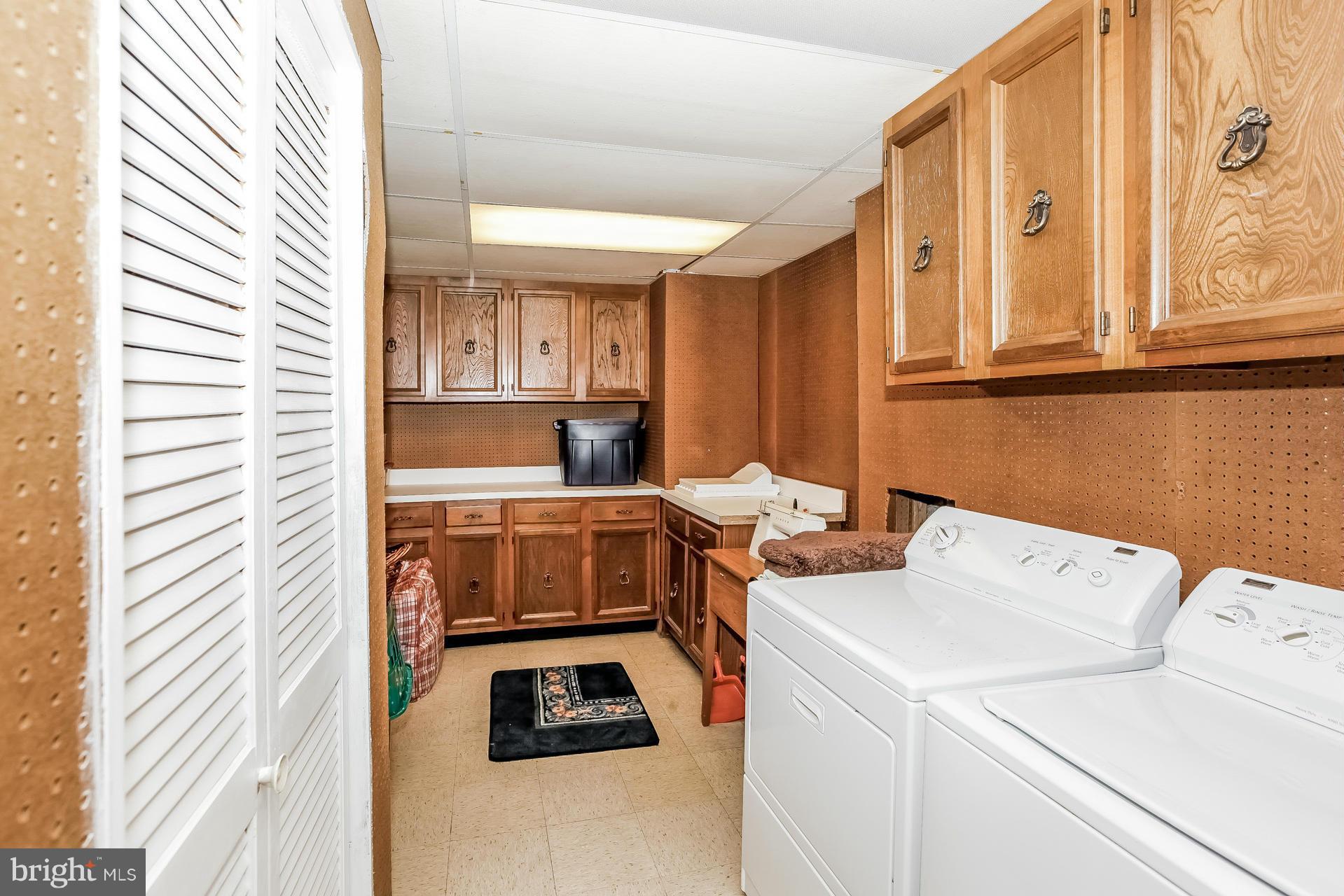 8932 Centerway Road Gaithersburg, MD 20879 - Photo 25 of 30 Laundry Room...with cabinets too!!