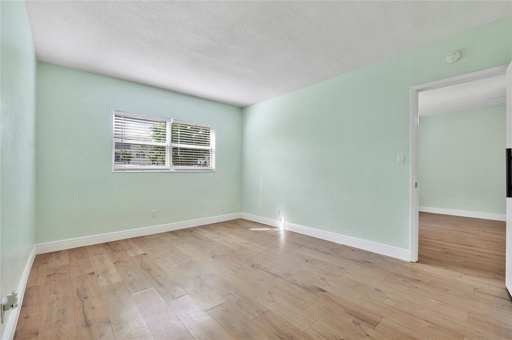 1951 Northeast 39th Street, Unit 156 Lighthouse Point, FL 33064 - Photo 13 of 43 Main Bedroom with on suite bathroom