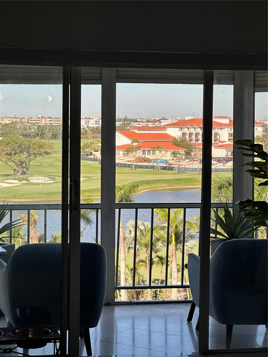 200 Diplomat Parkway, Unit 827 Hallandale Beach, FL 33009 - Photo 17 of 26 a view of a large window with an outdoor view