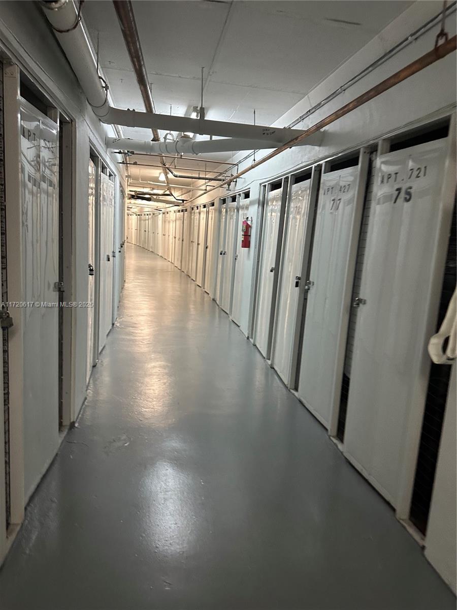 200 Diplomat Parkway, Unit 827 Hallandale Beach, FL 33009 - Photo 20 of 26 a view of a hallway